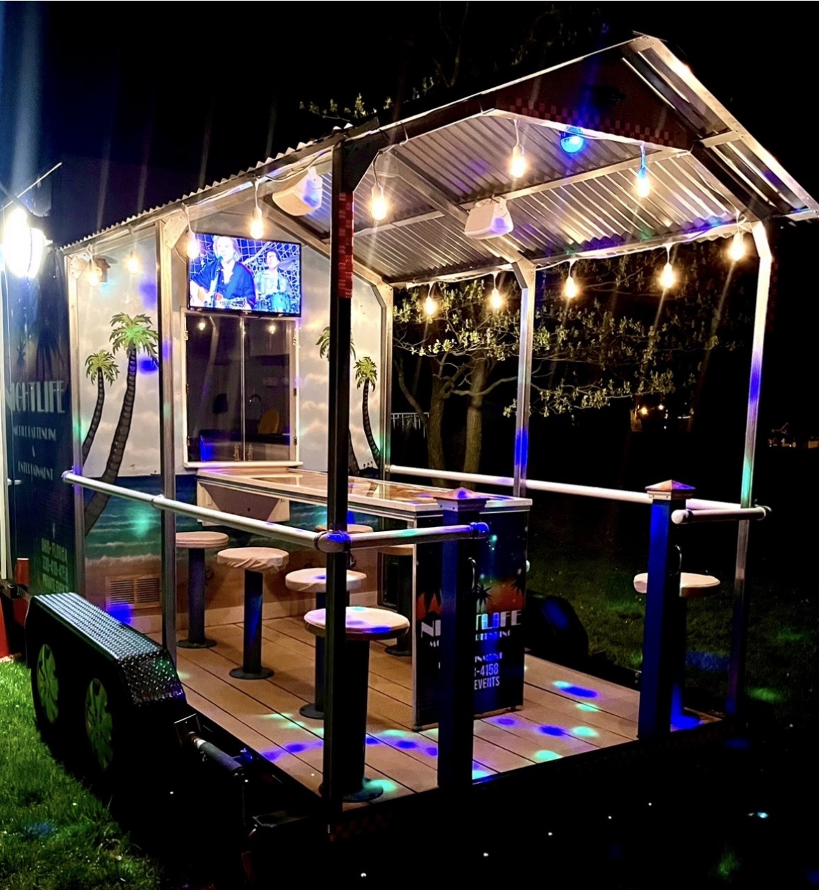 Nightlife mobile bar illuminated at night